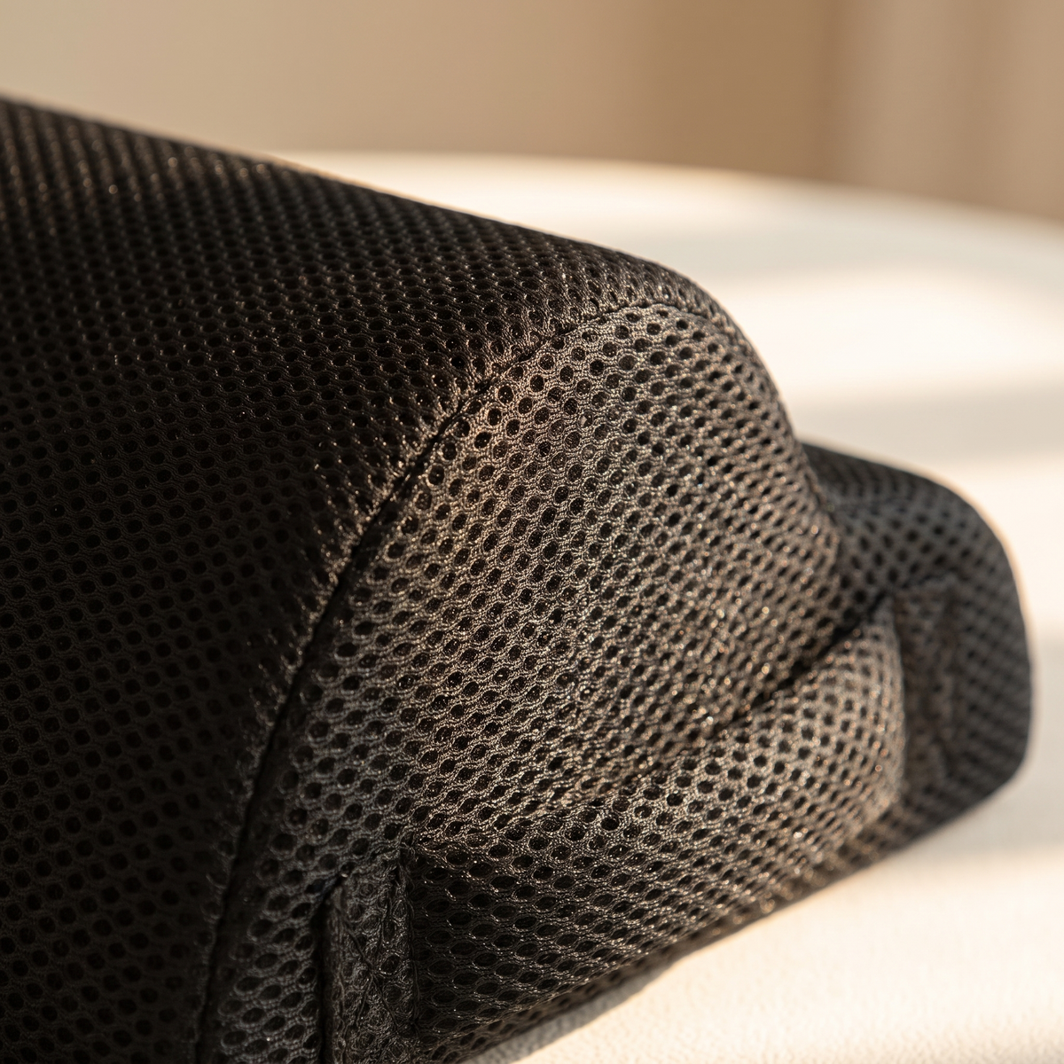 Close-up of the footrest cover fabric and contoured surface